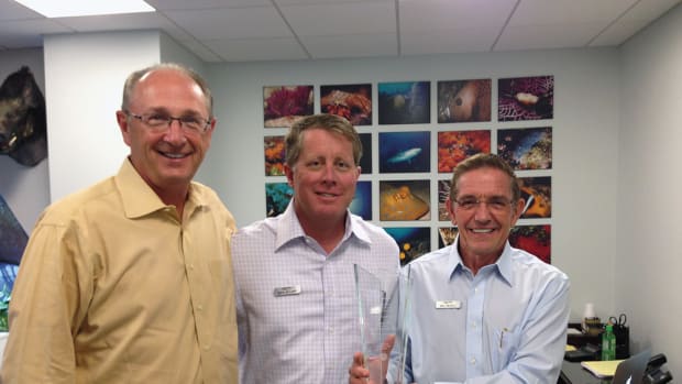 Van Wagoner with MarineMax executive vice president and CFO Mike McLamb (center)  and chairman/CEO Bill McGill.
