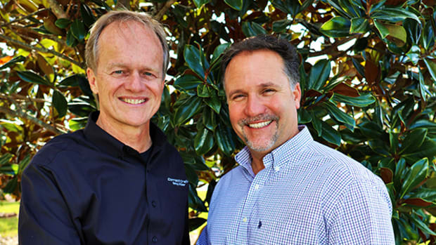 Paul Singer (right) was named president of Correct Craft brands Centurion Boats and Supreme Boats. He is shown with Correct Craft CEO Bill Yeargin.