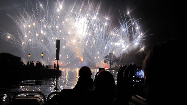 Disney World visitors can rent Sun Tracker pontoon boats to carry them to prime viewing spots for the nightly fireworks.