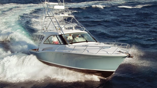 Denison carries a number of well-known brands, including Hatteras Yachts. Here, a 45-foot Hatteras charges through the ocean.