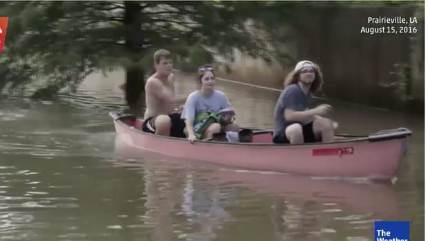The Weather Channel shot footage of boat rescues and people traveling roads by canoe in Louisiana on Monday.