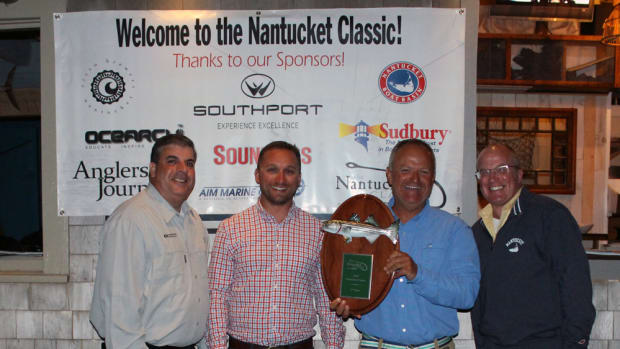 The Nantucket Classic tournament, sponsored by Southport and Soundings, was held Sept. 23-24. Shown are David Rose, (left), angler on the winning boat Summer Place (a Southport 33 FE); Southport's marketing manager, Jonathan Kirby; first-place winner and Summer Place owner Rob Miller; and Soundings publisher Paul Smith.
