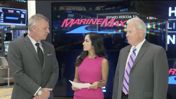 MarineMax chief revenue officer Chuck Cashman (left) and National Marine Manufacturers Association president Thom Dammrich are shown during the interview with Judy Shaw on the floor of the New York Stock Exchange.