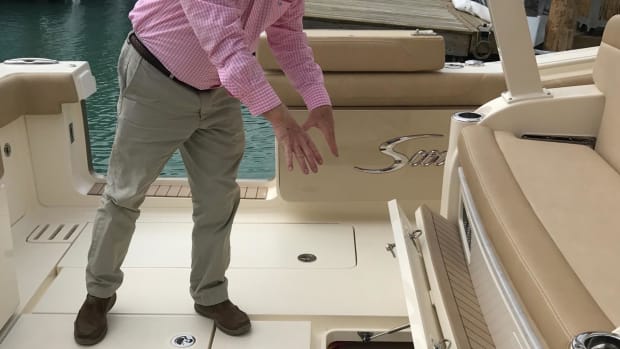 Introducing the Scout Boats 380 LXF, company president Steve Potts points to its gyroscope.