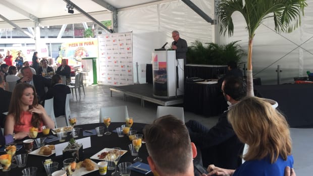 NMMA president Thom Dammrich speaks during the Innovation Breakfast this morning at the Miami International Boat Show.