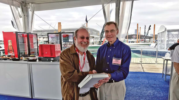 Soundings and Anglers Journal senior writer Jim Flannery accepts one of his four awards from BWI’s Greg Proteau.