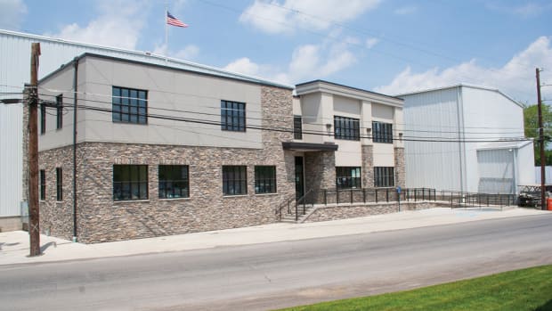 A new warehouse opened in June 2014 — 15 months after fire destroyed the company’s old facility.