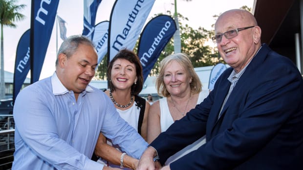 Gold Coast Mayor Cr Tom Tate (left) and Mayoress Ruth Tate are shown cutting the ribbon to officially open Maritimo’s new waterfront facility on Feb. 8 with Bill and Lesley Barry-Cotter.