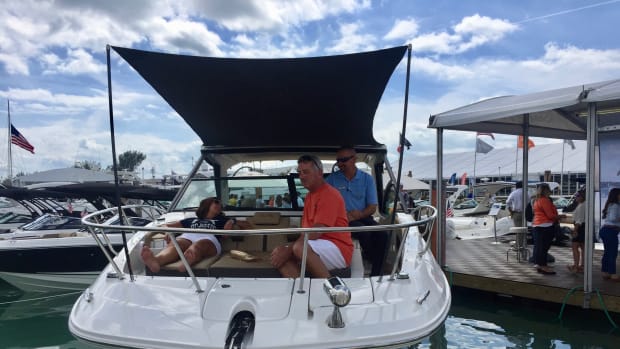 Miami International Boat Show visitors check out Sea Ray’s new Sundancer 320.