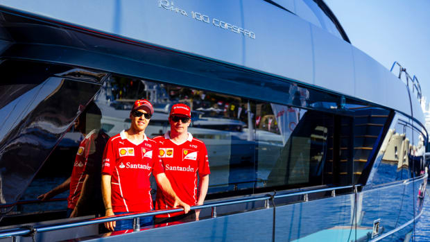 Scuderia Ferrari Formula One drivers Sebastian Vettel (left) and Kimi Raikkonen are shown aboard the Riva 100’ Corsaro. Riva sponsors the Scuderia Ferrari Formula 1.