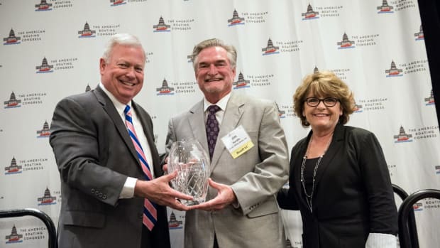 NMMA president Thom Dammrich (left) presents the 2017 BoatPAC Champions for Growth Award to Grady-White Boats. Accepting are company president Kris Carroll (right) and compliance/government affairs manager Jim Hardin.
