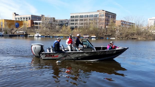 Evinrude E-TEC-powered boats picked up trash along the Milwaukee River basin during an Earth Day event on Saturday.