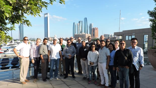 Participants in the Intermediate Marina Management course are shown at the Emirates Palace Marina in Abu Dhabi.