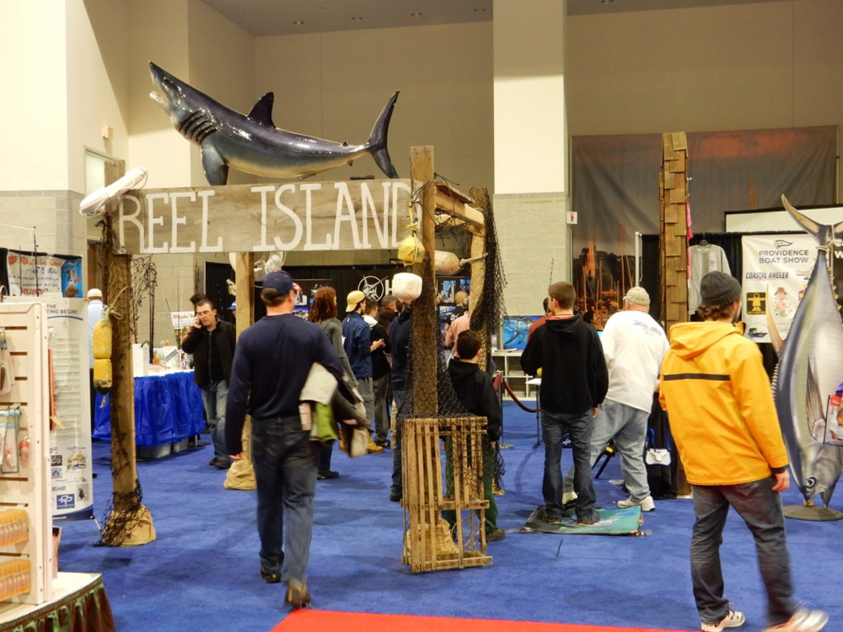 Visitors are shown browsing the Reel Island section of the Providence Boat Show last year.