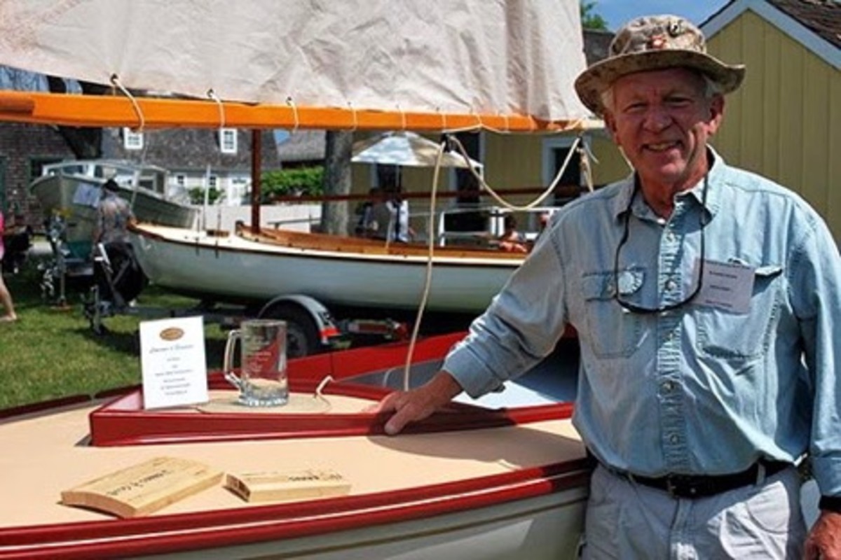 Richard Honan, of Winthrop, Mass., is shown with his boat Proud Mary II, the 2014 winner of the “I Built it Myself” Award sponsored by Interlux at the WoodenBoat Show.