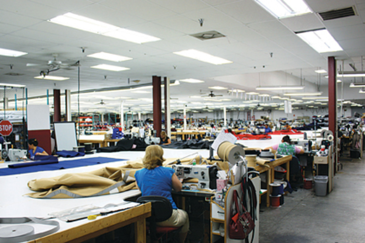 Workers produce canvas at an Ameritex facility in Bradenton, Fla.