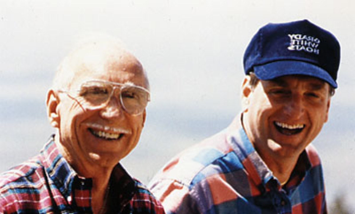 Eddie with his father, George, whom he credits for his business success.