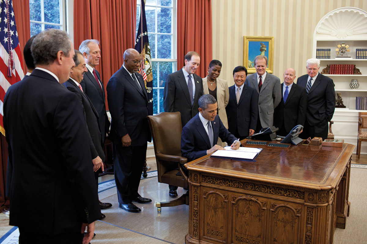 Yeargin (third from right) met President Obama after the president signed a free-trade agreement in 2011 with Panama, Colombia and South Korea.