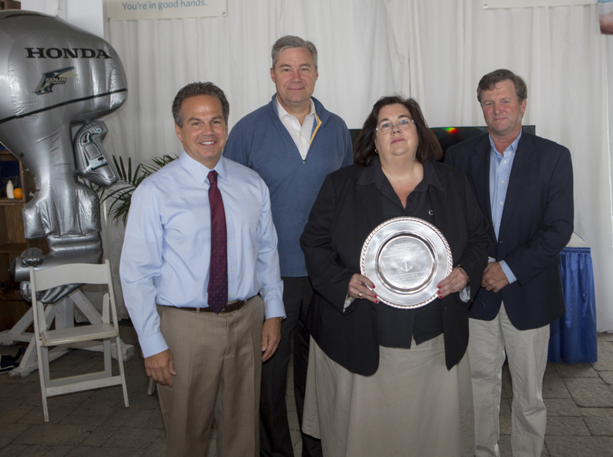 Sally Helme (second from right) received the 2014 RIMTA Anchor Award at the Annual Industry Breakfast on Sept. 13 in Newport, R.I. She is shown with U.S. Rep. David Cicilline, U.S. Sen. Sheldon Whitehouse and Brad Read. PHOTO CREDIT: Billy Black