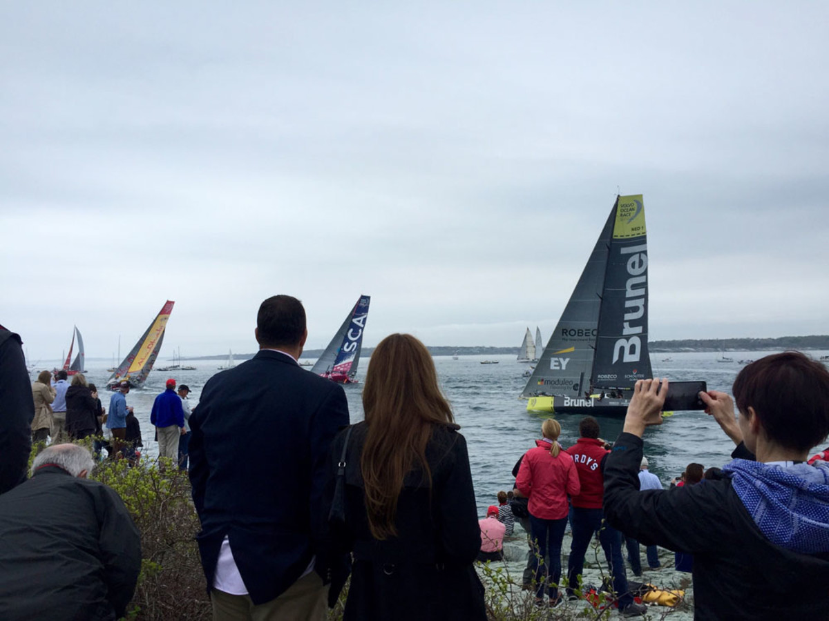 Spectators gather Saturday at Castle Hill in Newport, R.I., to watch the Volvo Ocean In-Port Race.