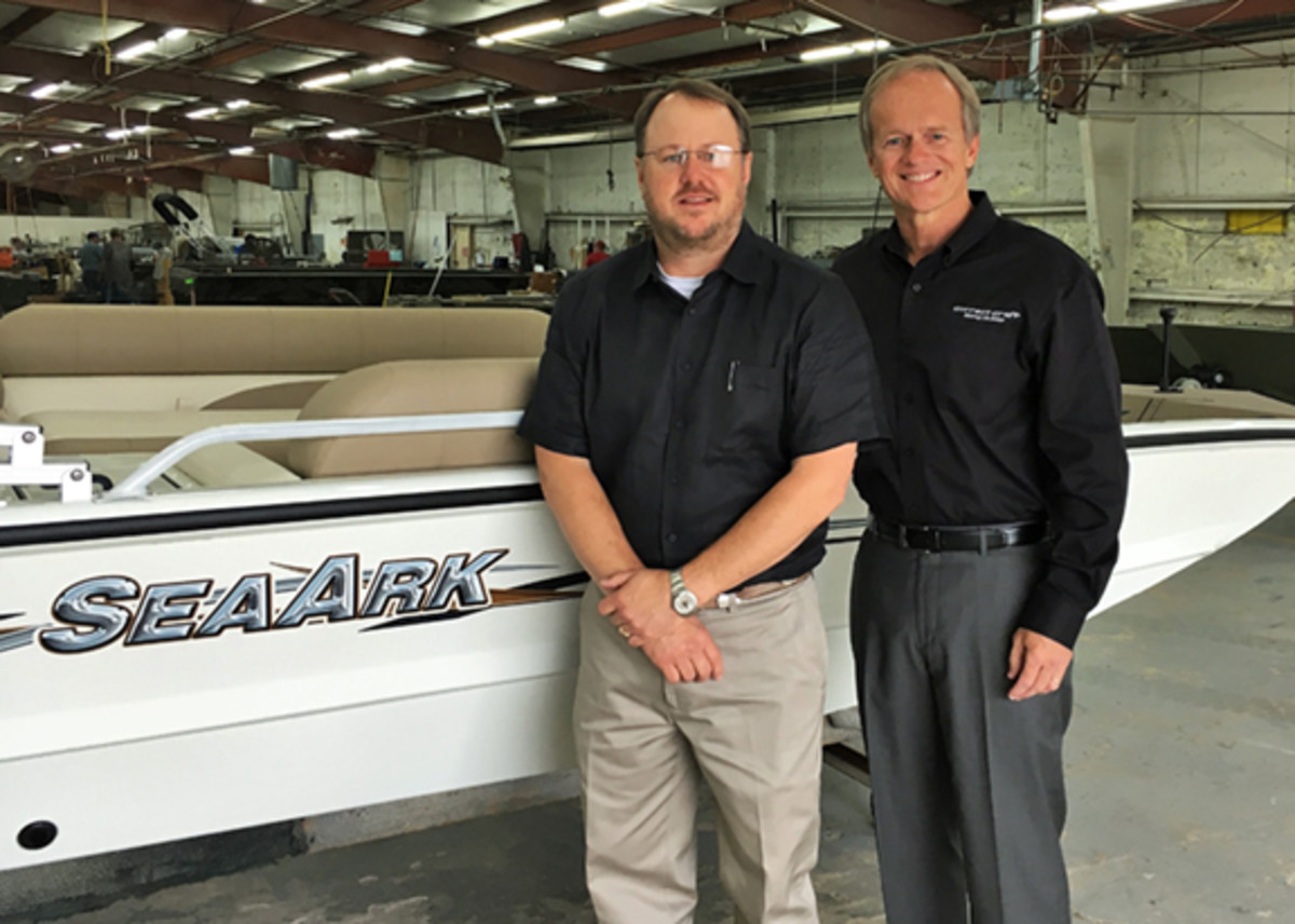 Correct Craft president and CEO Bill Yeargin (right) named Steve Henderson president of the aluminum fishing boat builder SeaArk Boats.