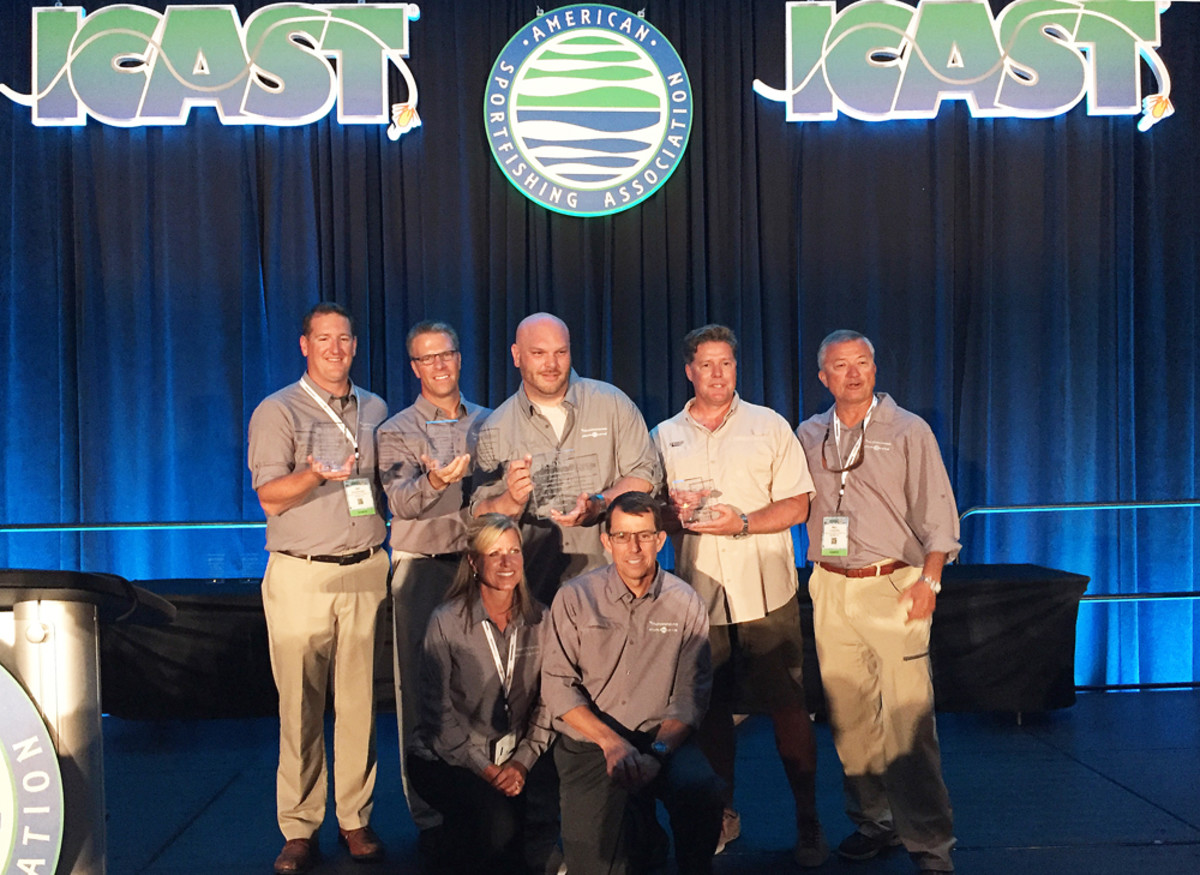 Johnson Outdoors captured the overall Best of Show award at ICAST for its Minn Kota Ultrex trolling motor. Company employees are shown at the Chairman's Industry Awards Reception.
