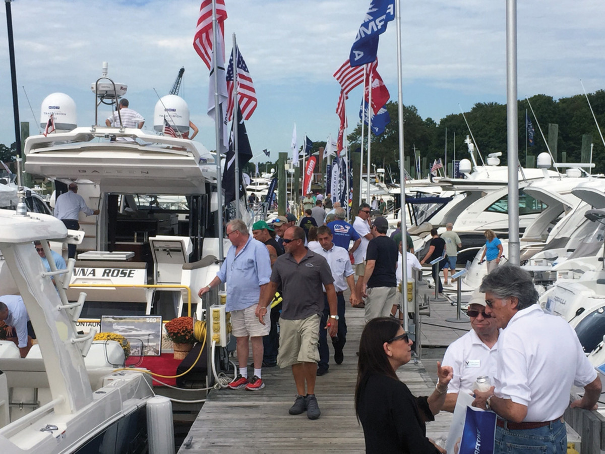 Formula boats are shown on display at the Norwalk show. Good early-fall weather attracted a sizable number of buyers. The NMMA said attendance was up 6 percent.