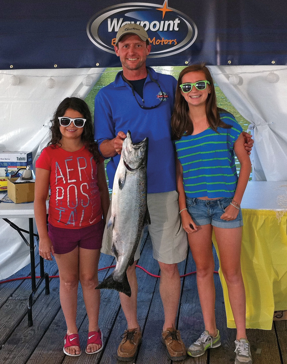 Harris fishes at local derbies with daughters Jackie (left) and Bailey.