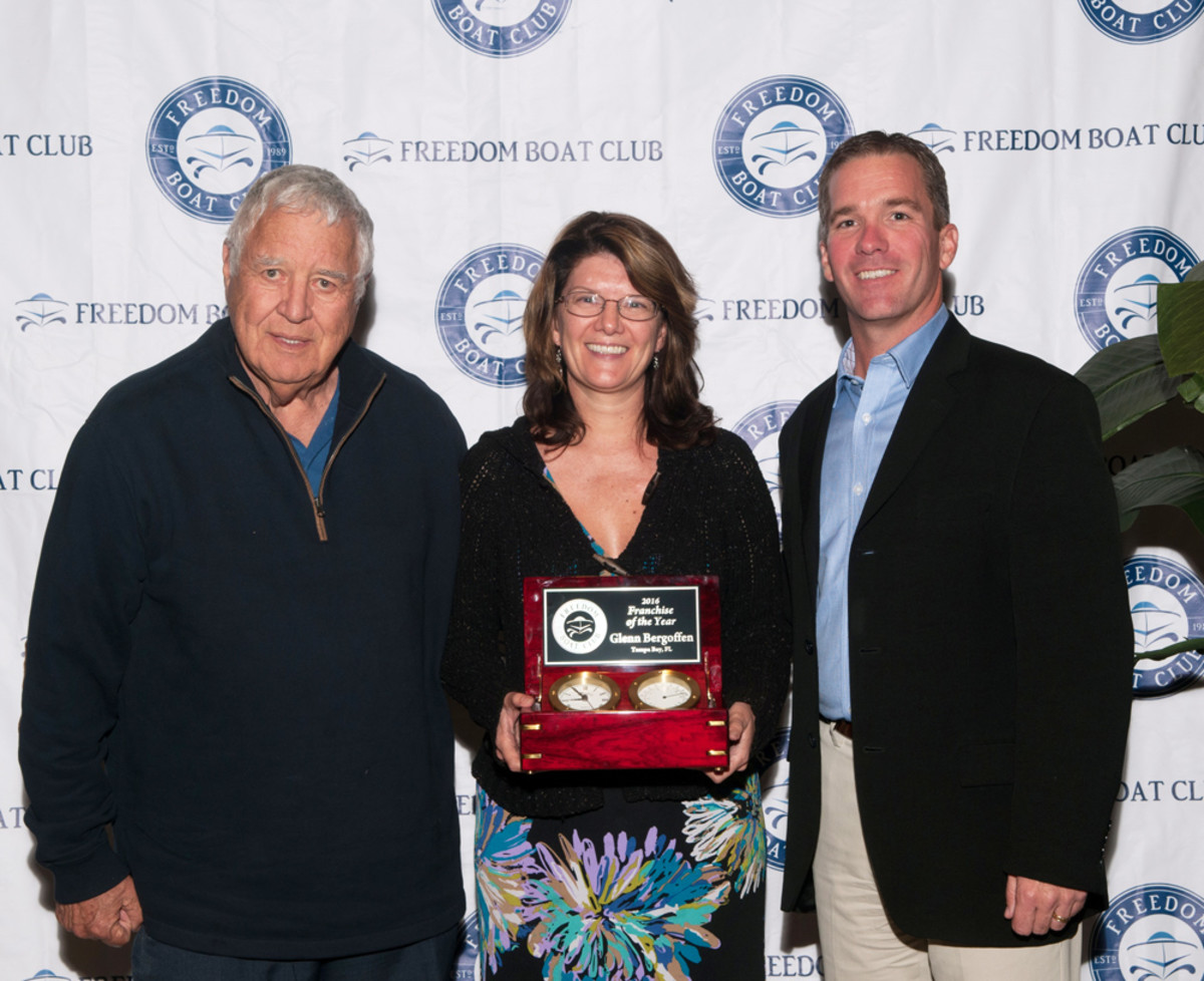 Freedom Boat Club Tampa Bay, owned by Glenn Bergoffen (left), received four of the franchisor’s top national awards, including 2016 Franchise of the Year. He is shown with chief operating officer Lisa Reho and Freedom Boat Club president and CEO John Giglio.
