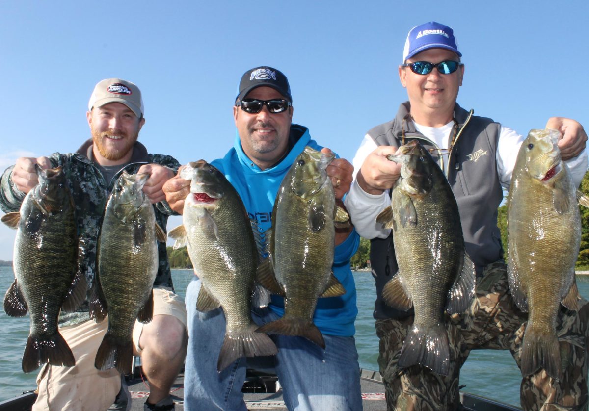 Contestants in the BoatUS “Best Catch” Photo Contest are competing for a chance to fish for a day with former pro angler and fishing personality Mark Zona (center).