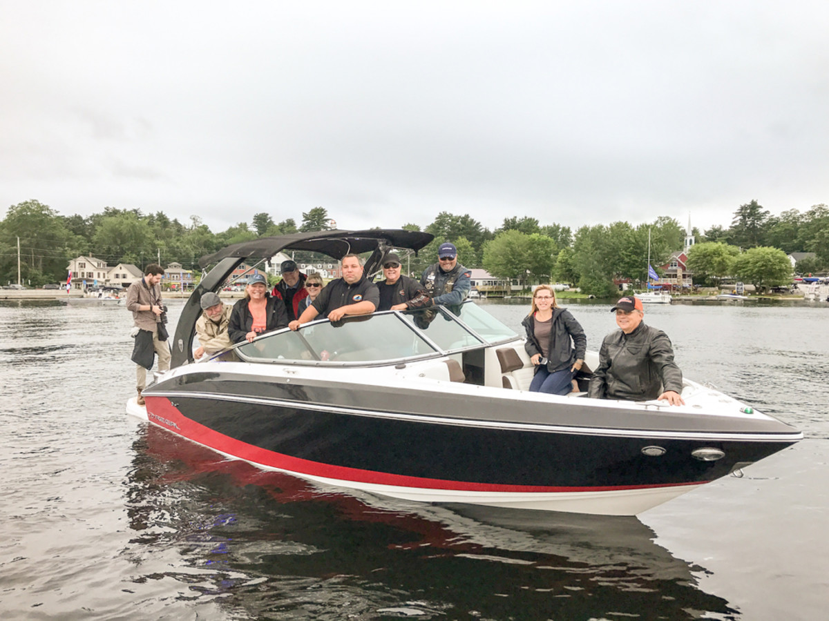 Tour members enjoy a tour of Brandy Pond aboard a 25-foot Regal from Moose Landing Marina.