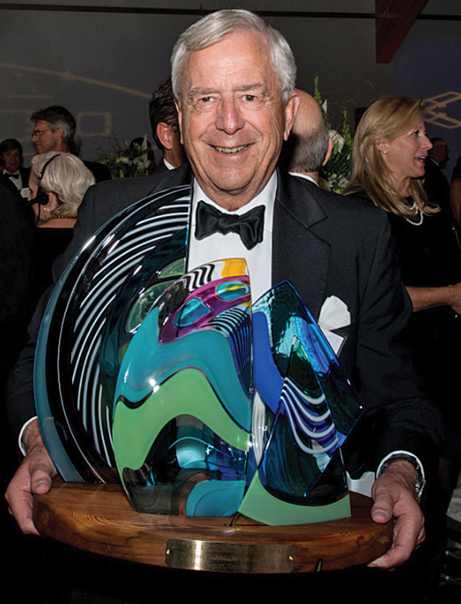 Johnstone, with the Mystic Seaport America & the Sea Award for 2016. He also was inducted into the National Sailing Hall of Fame last year.