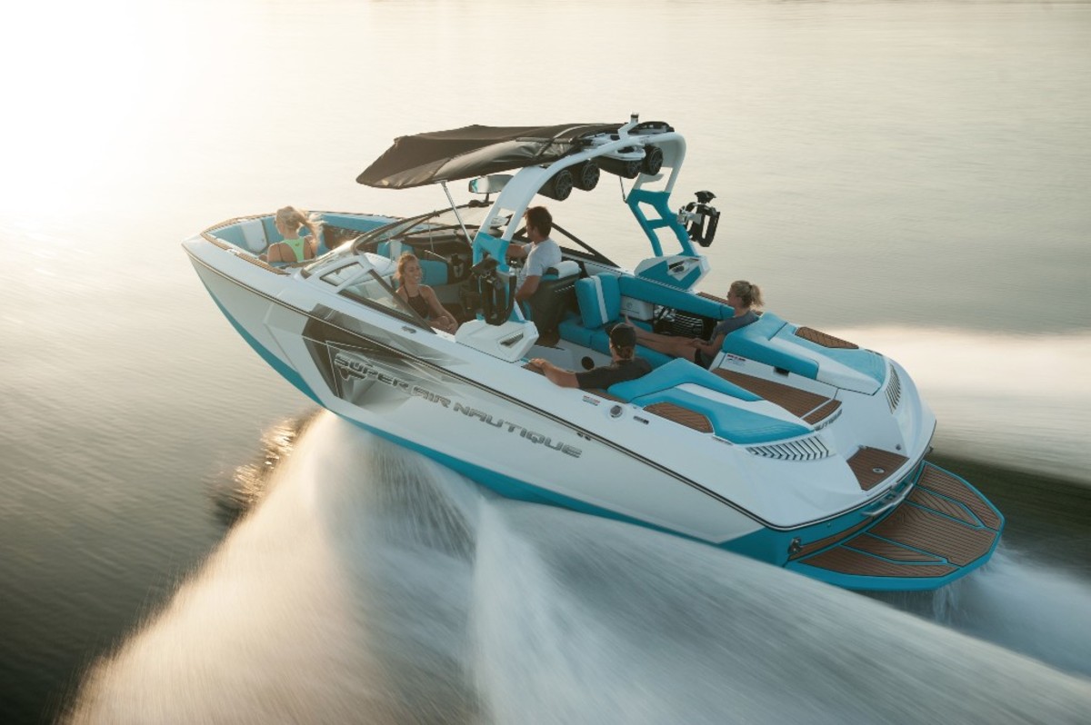 Photo of Nautique boat and two riders