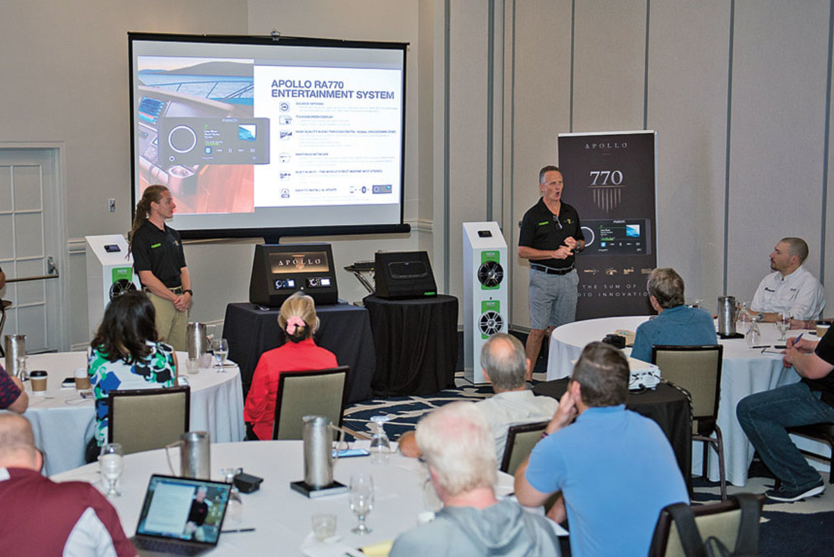 Fusion managing director Chris Baird (standing) introduces the Apollo series. 