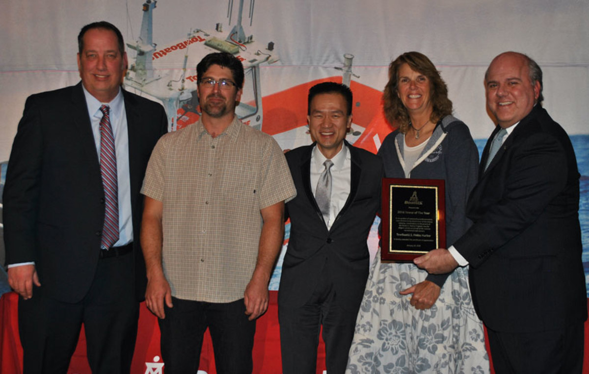 Representing TowBoatUS Friday Harbor, which won Tower of the Year honors, are Capt. Deb Fritz (second from right) and Capt. Andrew DiRienzo (second from left). Others shown are TowBoatUS vice president Adam Wheeler (left); BoatUS chairman and CEO Kirk La (middle); and BoatUS vice president Jerry Cardarelli (right).