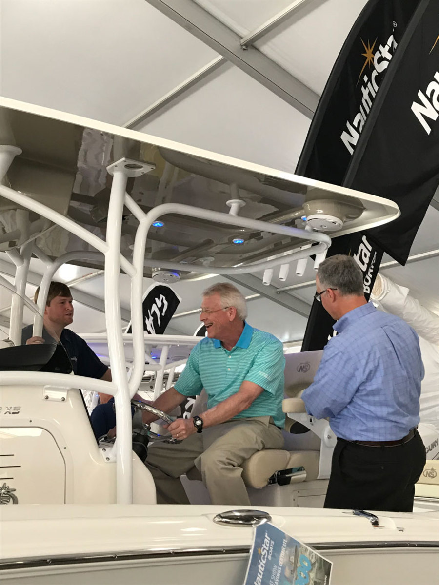 Sen. Wicker (center), one of the bill’s authors, met with NauticStar sales manager Philip Faulkner (left) and NauticStar president Tim Schiek (right) at the Miami International Boat Show.