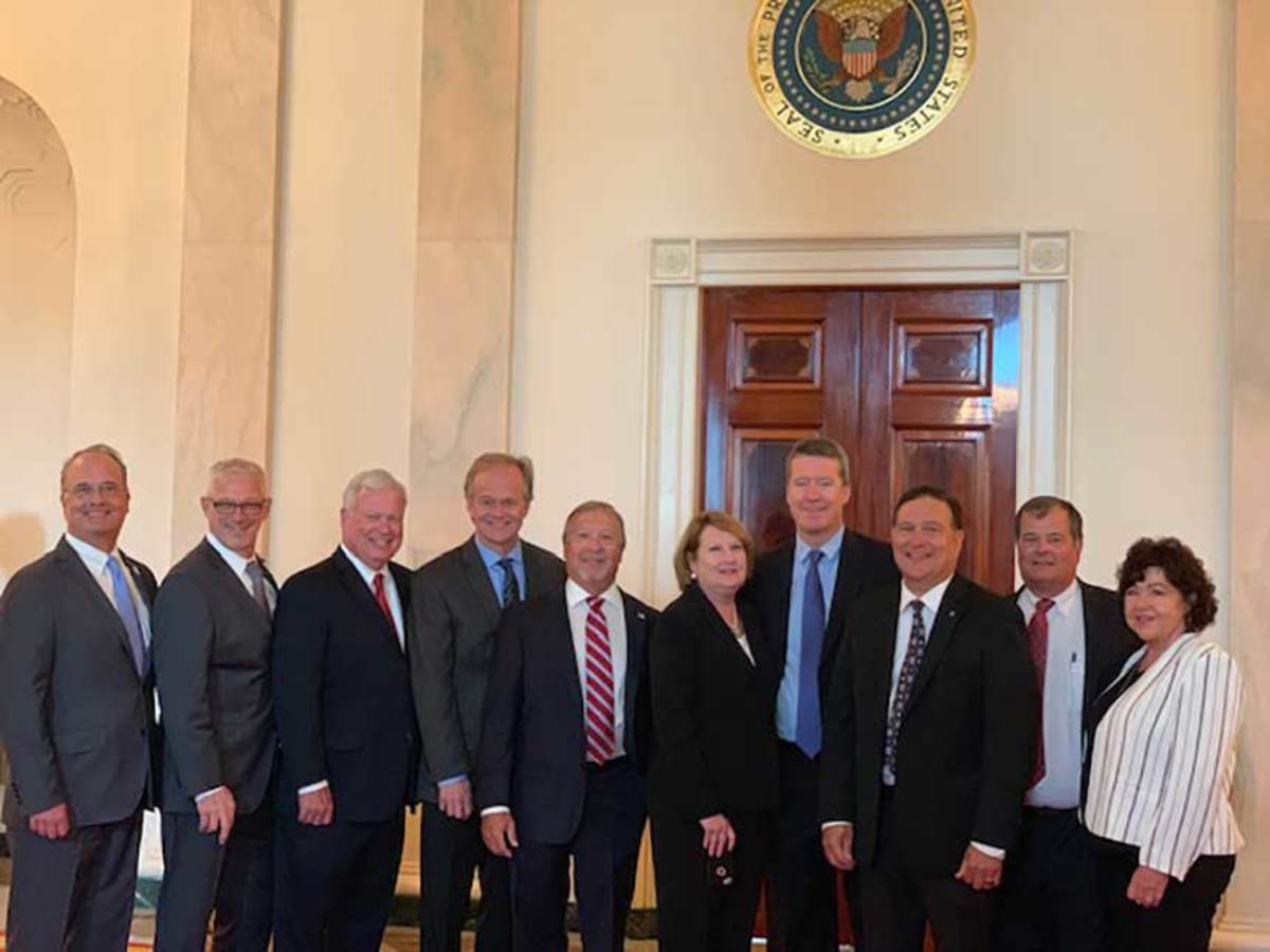 (From left) Ned Trigg, executive vice president, Dometic; Frank Hugelmeyer, president-elect, NMMA; Thom Dammrich, president, NMMA; Bill Yeargin, CEO, Correct Craft; Joe Neber, president, Contender; Joan Maxwell, president, Regulator; Steve Heese, CEO, Chris-Craft; Ben Speciale, president, Yamaha U.S. Marine Business Unit, chairman, NMMA board of directors; Bill Watters, president, Syntec; and Ann Baldree, vice president, Chaparral and Robalo.