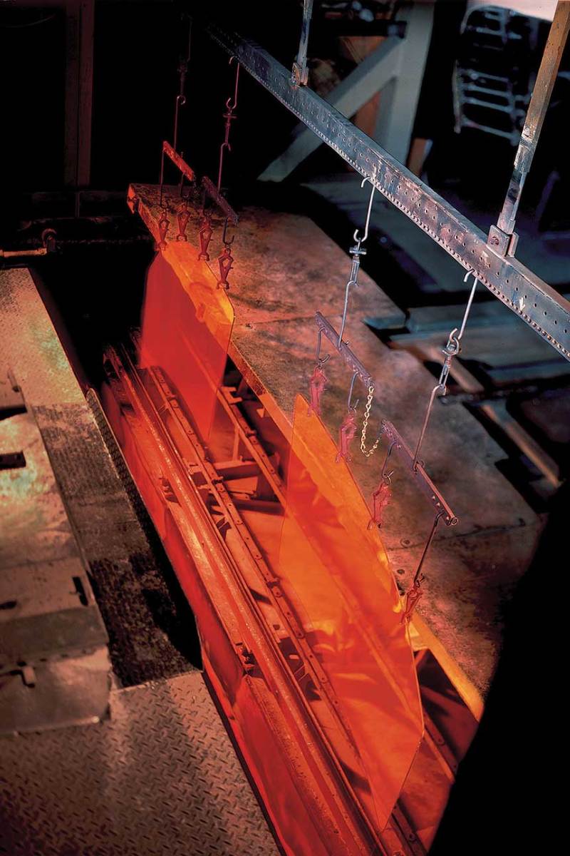Glass pieces go into the furnace before they are curved into a final shape. 