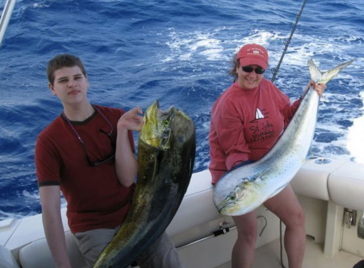 Nathan Carman (left) and his mother Linda Carman (right) on a fishing trip. Photo courtesy of law offices of Hubert J. Santos via Hartford Courant.