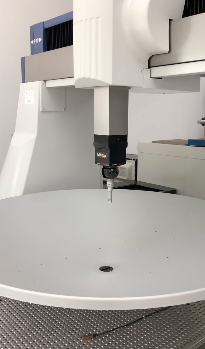 KVH manufactures parabolic reflectors using a coordinate measuring machine that’s accurate to ten thousandths of an inch.