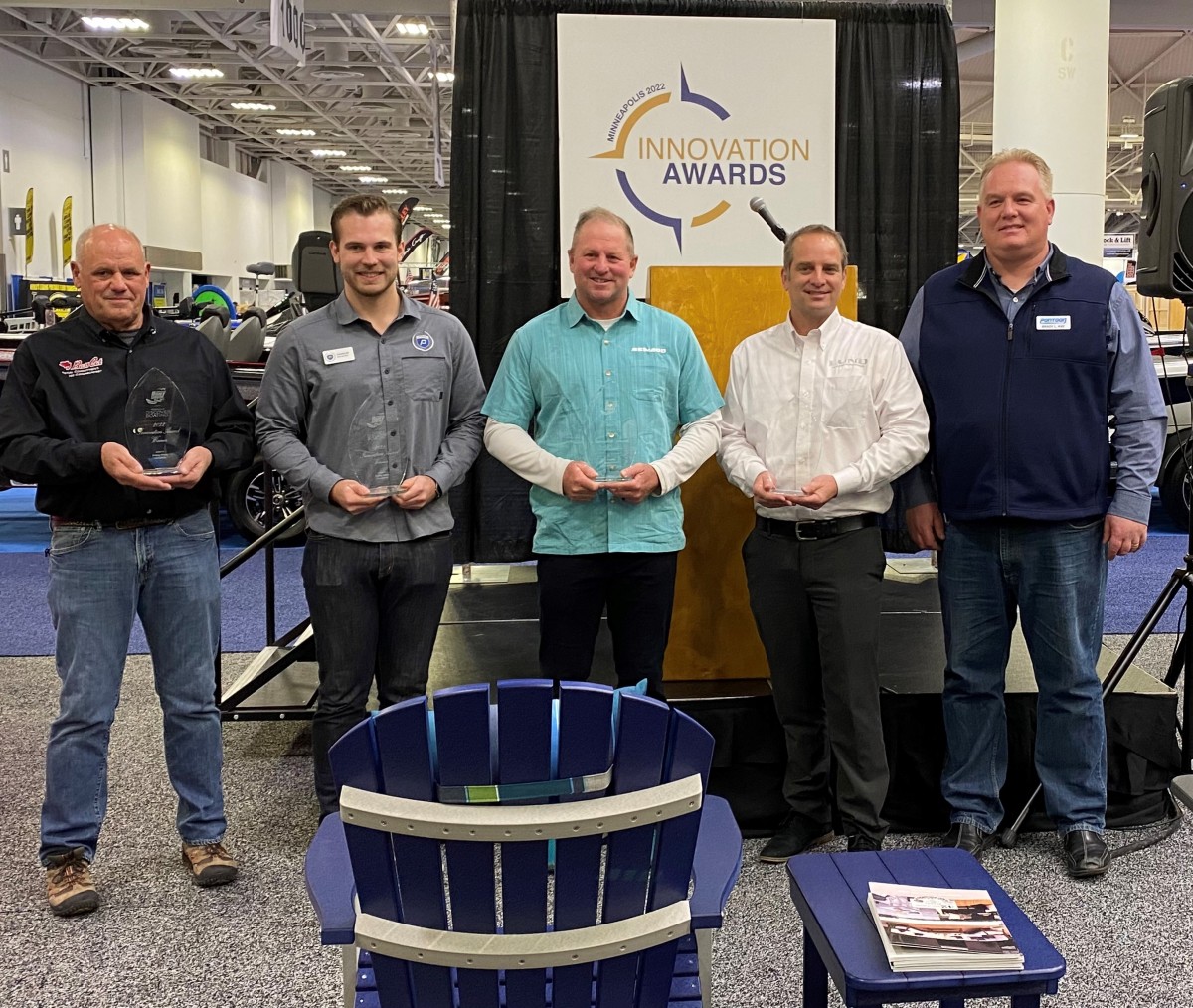 (From left ) Minneapolis Innovation Award winners Bass Cat Boats, Premier Marine , Sea-Doo and Lund Boats with awards chair Brady Kay.