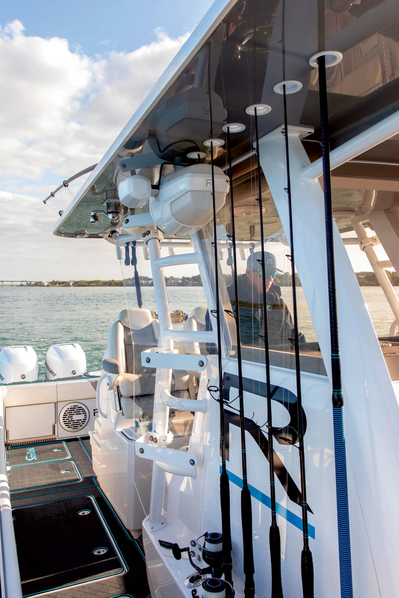 Roswell’s Ridge plexiglass air dams attach to the console to eliminate wind and spray at the helm.