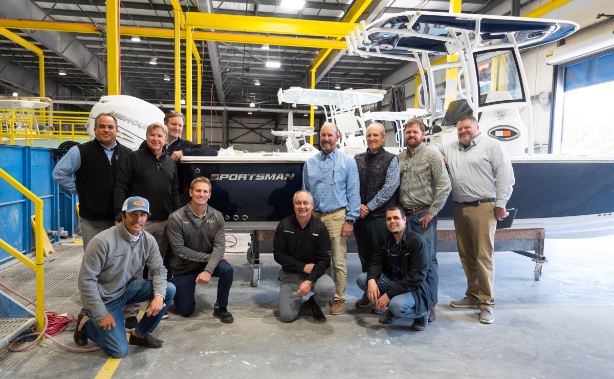 The teams from Valhalla Boat Sales and Sportsman at Sportsman’s Summerville, S.C., boatbuilding facility.