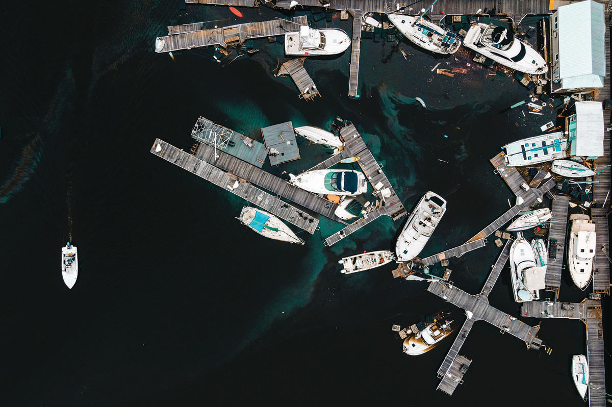 A marina destroyed by Hurricane Sally in 2020. (Below) Warmer La Niña waters, which can enhance hurricane formation, are beginning show in satellite images.