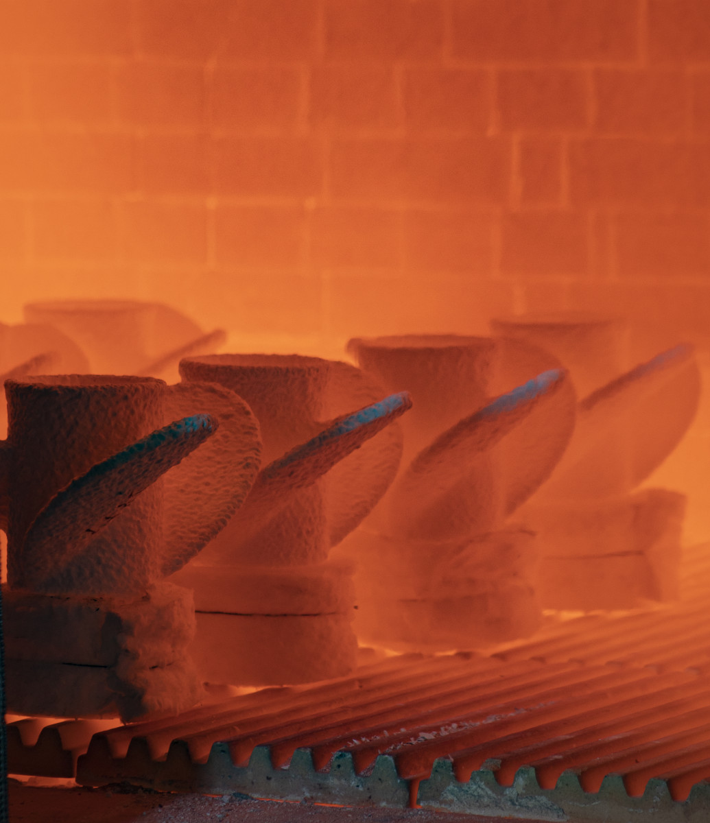 Ceramic propeller molds are heated to 1,800 degrees prior to being filled with molten 15-5 stainless-steel alloy.